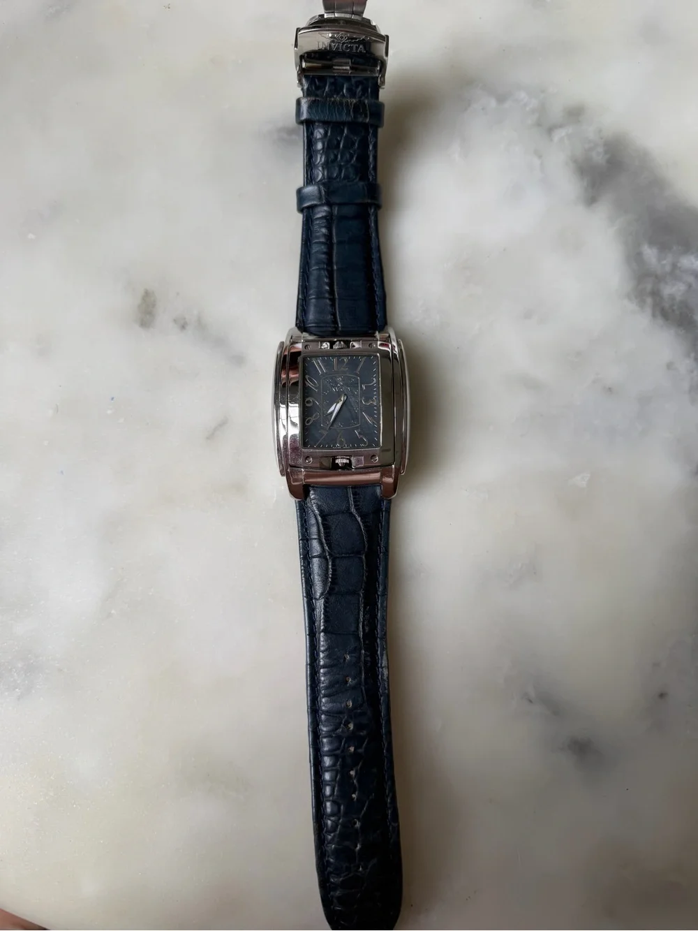Invicta Men's Silver Case Flip Face Watch  with Dark Blue Leather Strap